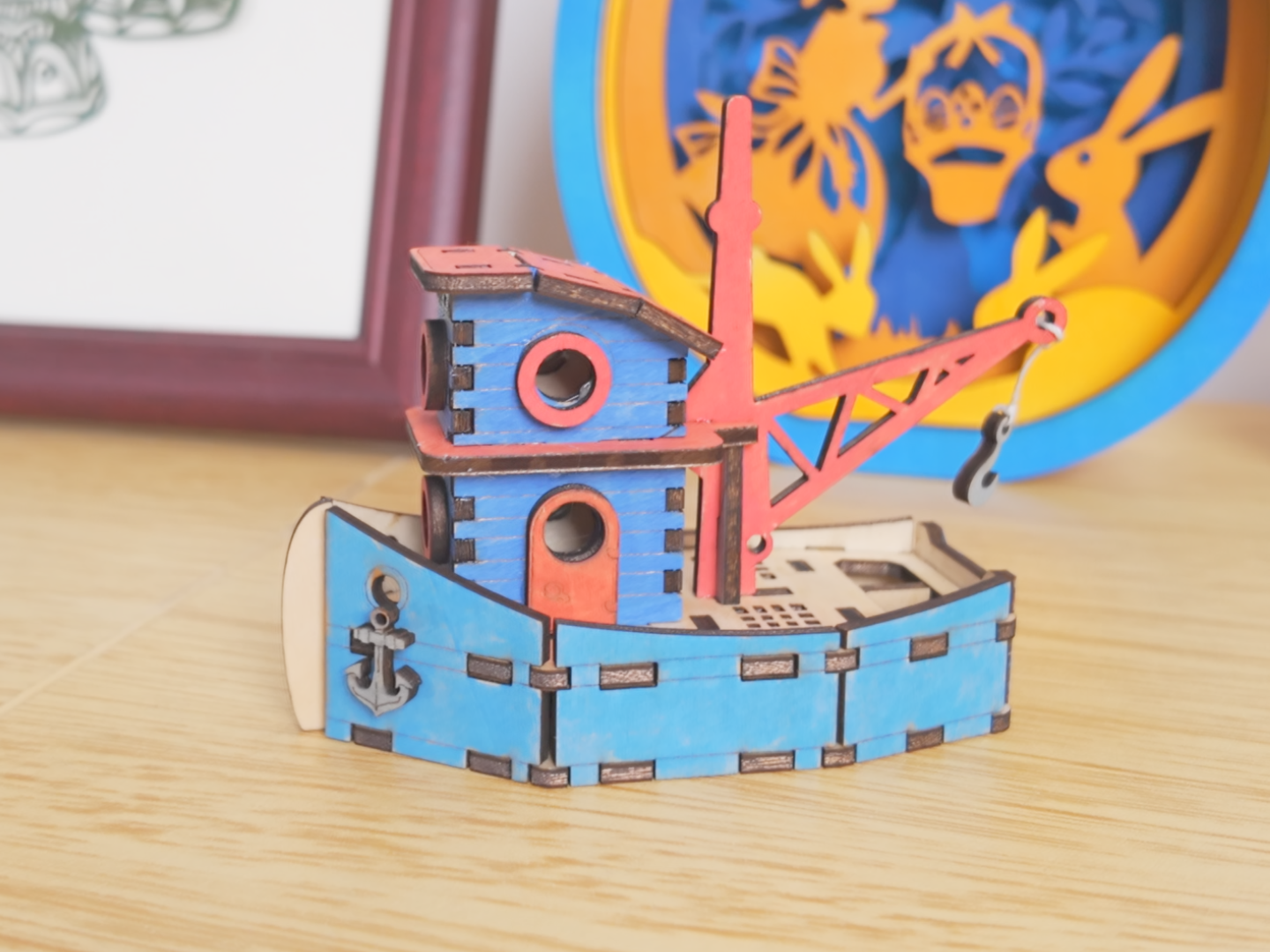 Barcos miniatura cortados con láser